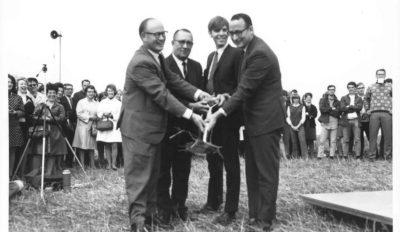 groundbreaking ceremony image of four men with shovel